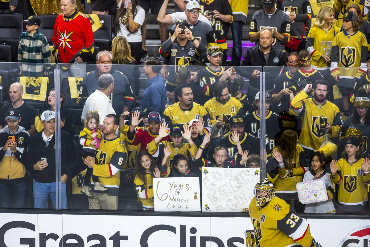 Golden Knights goaltender Adin Hill (33) skates past fans for warmups before Game 5 of the NHL ...