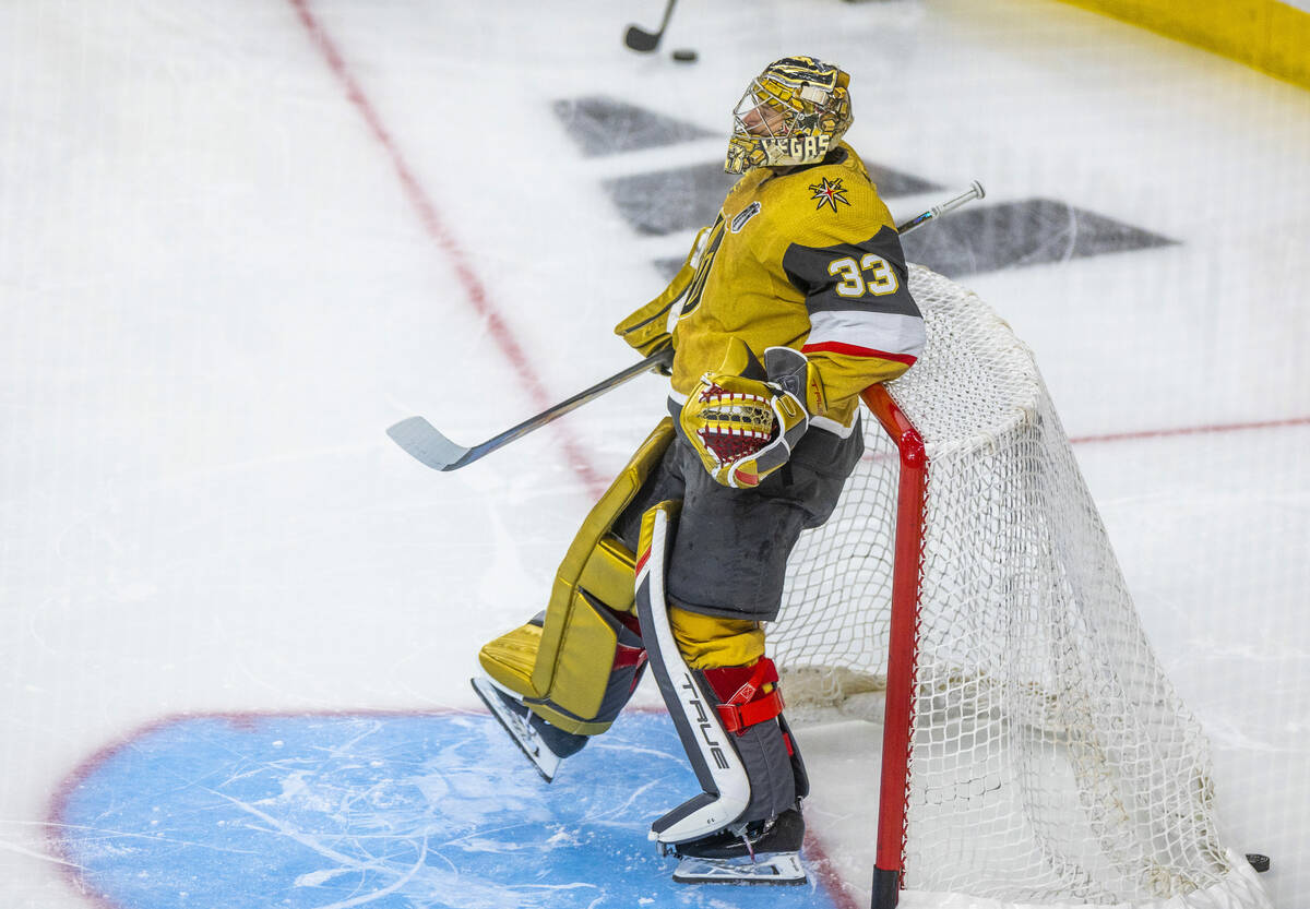 Golden Knights goaltender Adin Hill (33) kicks back on the goal during warmups before Game 5 of ...