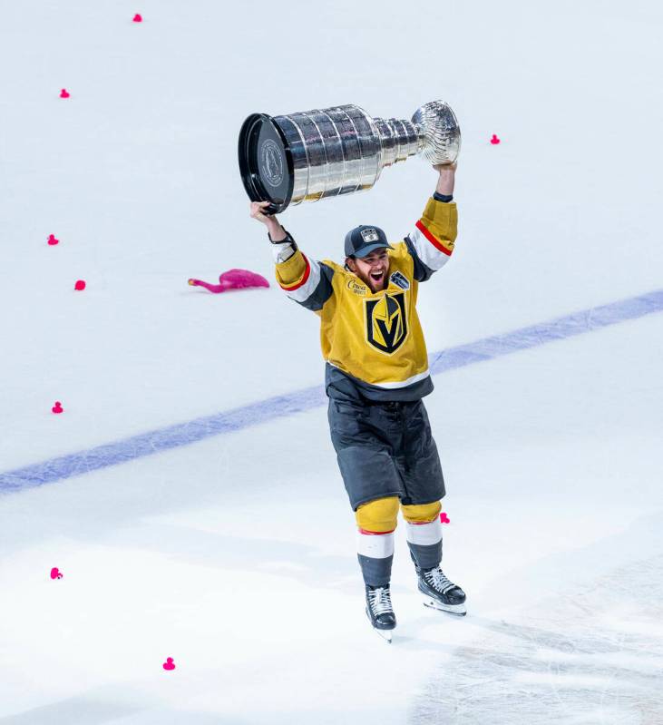 Golden Knights right wing Jonathan Marchessault (81) hoists the Stanley Cup after defeating the ...