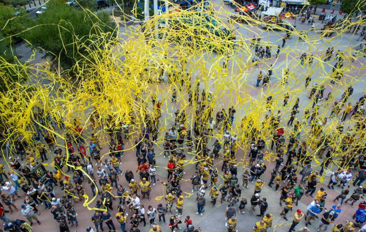 Streamers come down on fans in Toshiba Plaza before Game 2 of the Stanley Cup Final at T-Mobile ...