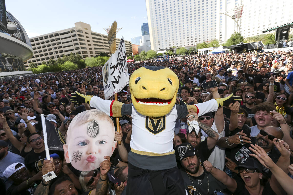 Golden Knights mascot Chance jumps on fans before Game 1 of the Stanley Cup Final outside T-Mob ...