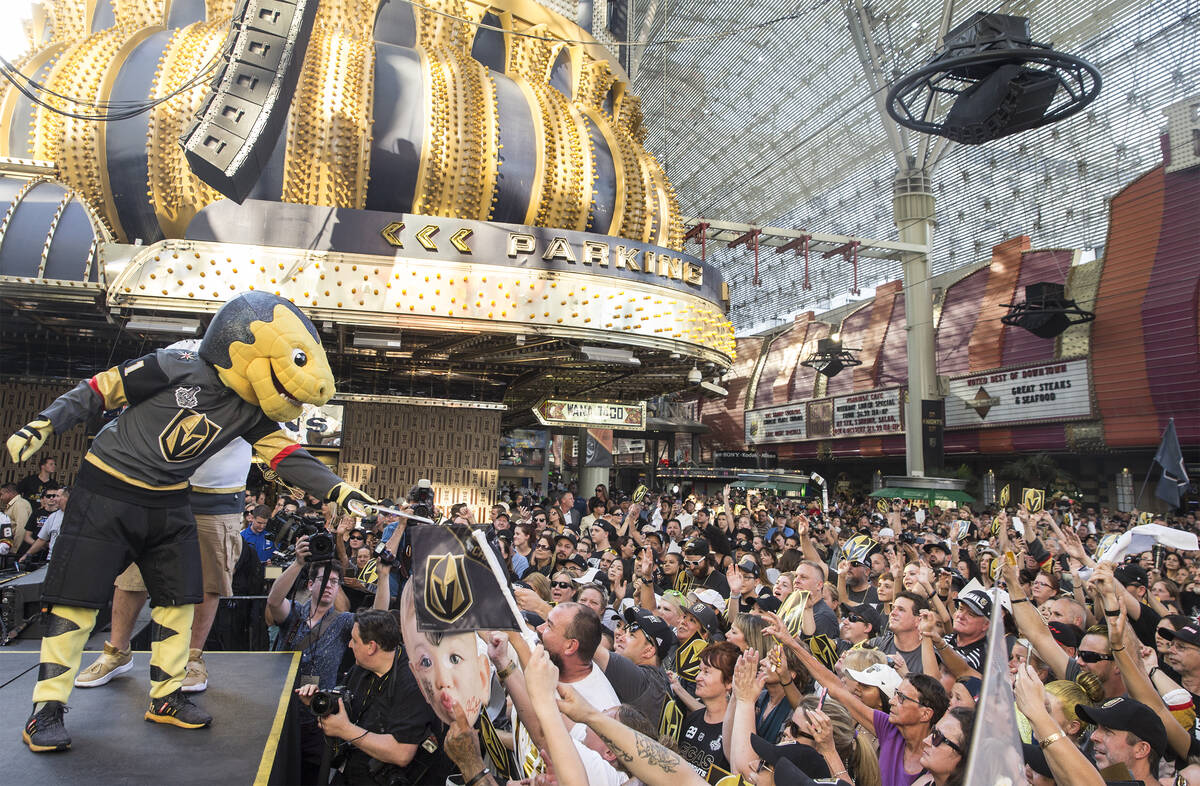 Golden Knights mascot Chance, left, entertains the crowd on Wednesday, June 13, 2018, at the Fr ...