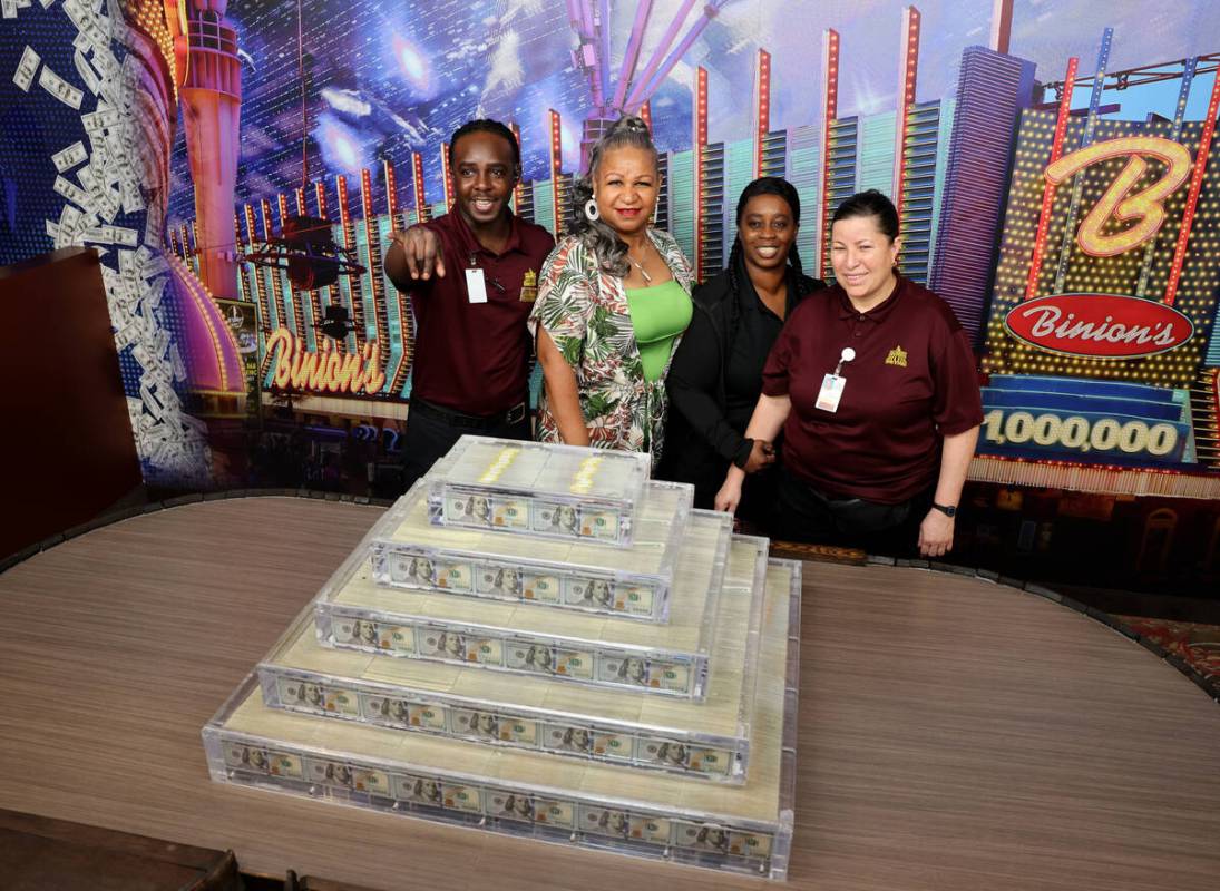 Employees, from left, Demetrius Parker, Norma Myles, Gail Sheppard and Faustina Hernandez pose ...