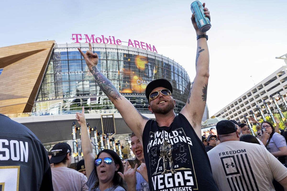 Fans crowd Toshiba Plaza before the Golden Knights parade down the Las Vegas Strip to celebrate ...