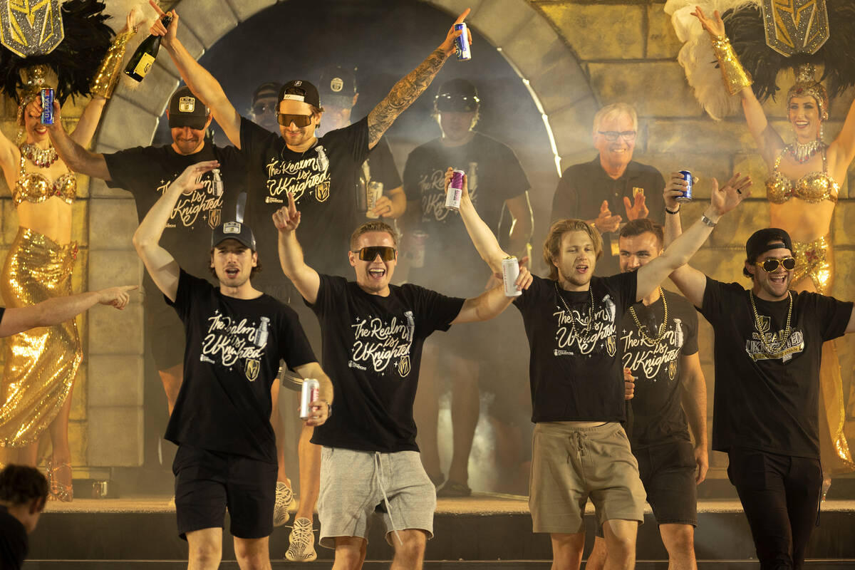 The Golden Knights flood the stage for their post-Stanley Cup win celebration outside T-Mobile ...