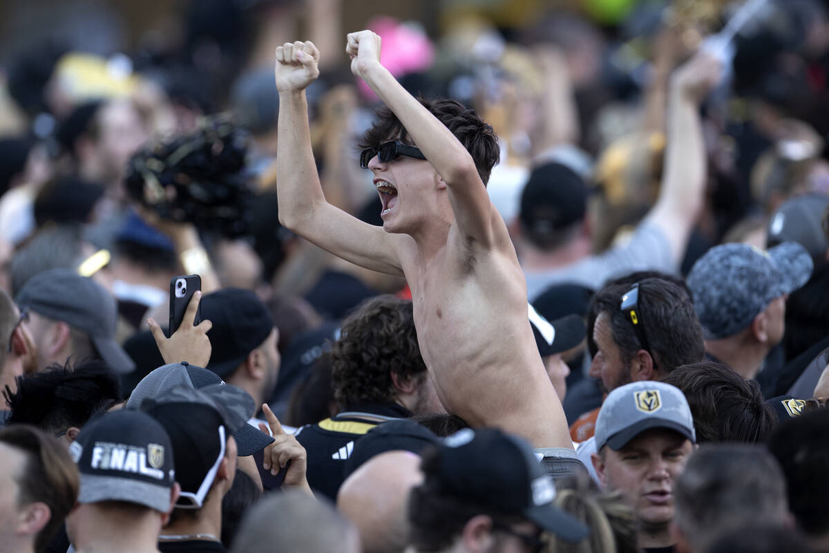 A Golden Knights fan is hoisted into the air during the team’s celebration of their Stan ...