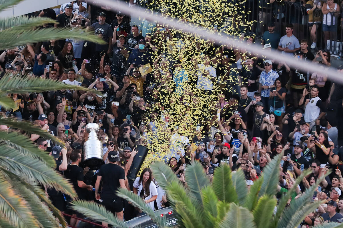 The Stanley Cup is lifted up in front of fans during the Vegas Golden Knights Stanley Cup Champ ...