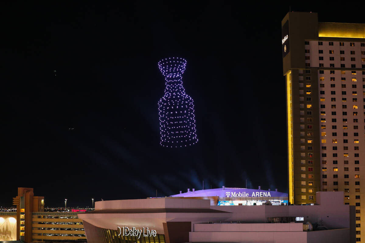 A drone light show is displayed above the T-Mobile Arena during the Vegas Golden Knights Stanle ...