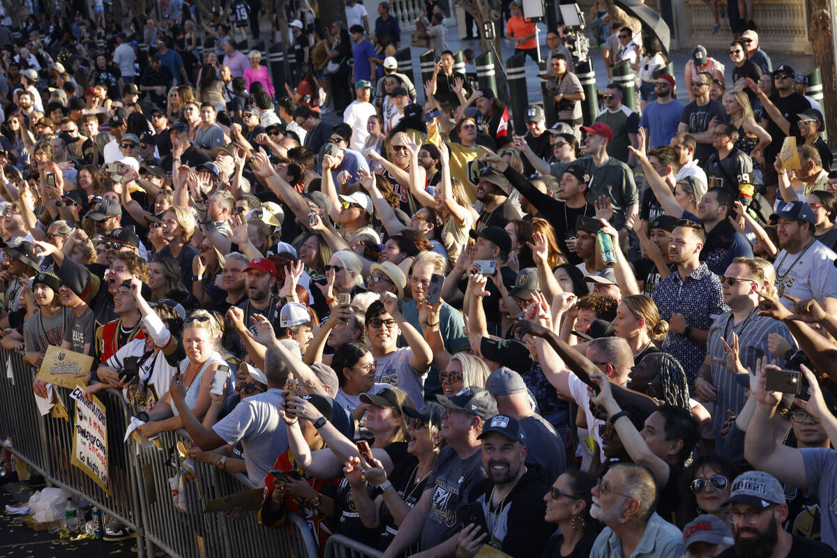 Fans cheer during the Golden Knights’ NHL hockey Stanley Cup victory parade, Saturday, J ...