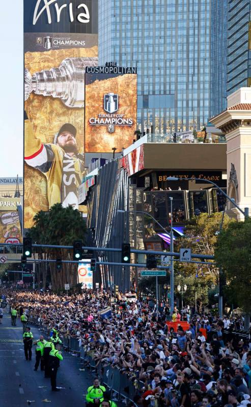 Fans cheer during the Golden Knights’ NHL hockey Stanley Cup victory parade, Saturday, J ...