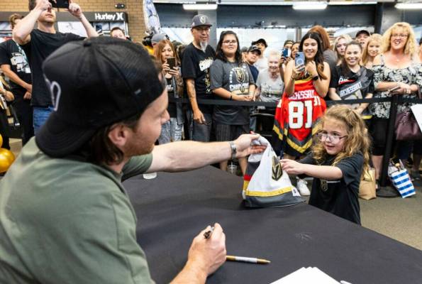 Parker Ashbaugh's, 4, receives her signed Golden Knights jersey from Jonathan Marchessault at D ...