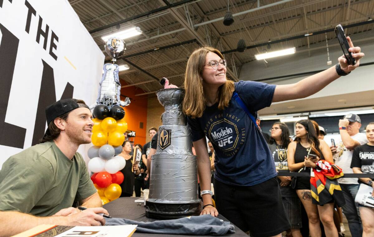 Jonathan Marchessault poses for a photo after signing an autograph to Valerie Brown at Dick's S ...