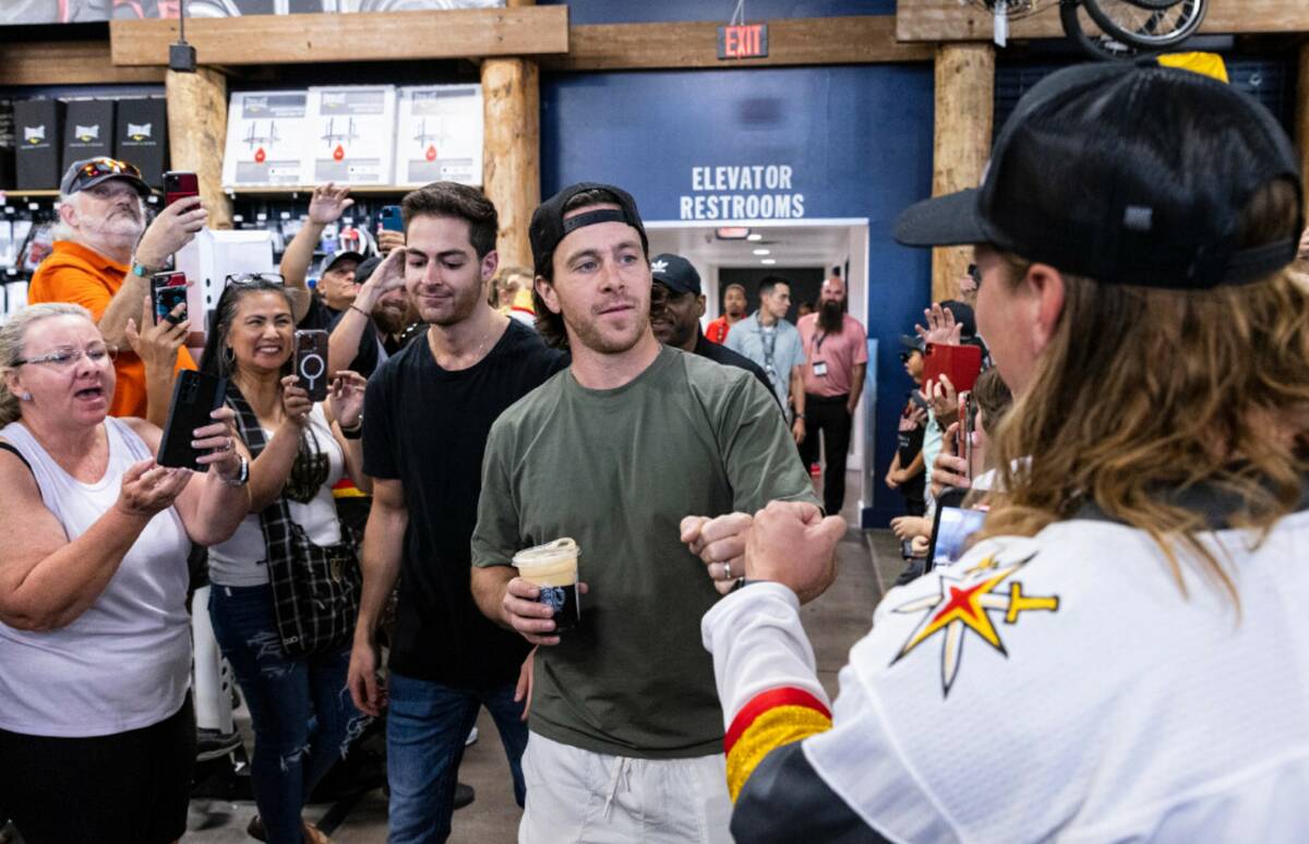 Jonathan Marchessault exchanges a fist bump with a fan at Dick's Sporting Goods, on Monday, Jun ...