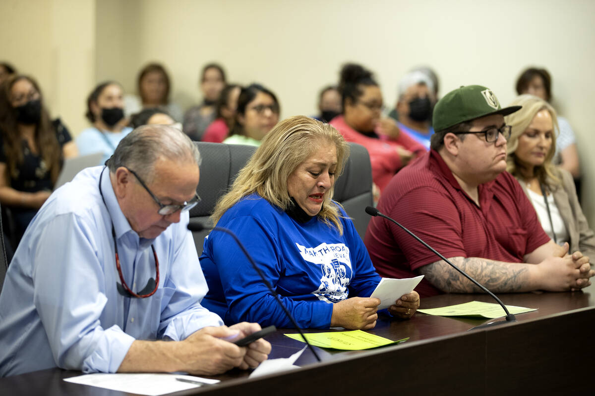 Alicia Cruz, a member of non-profit community organization Make the Road Nevada, tears up while ...