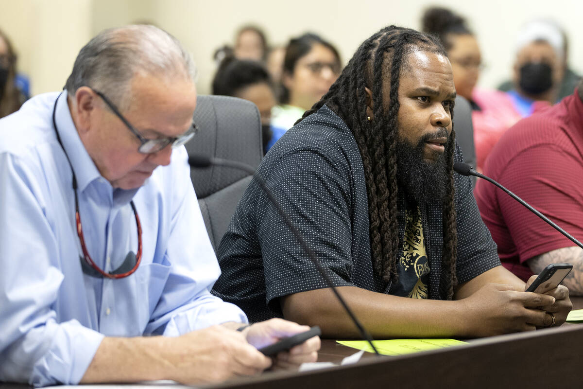 Marlon Anderson, a local pastor, speaks to the Public Utilities Commission about the harm he fe ...