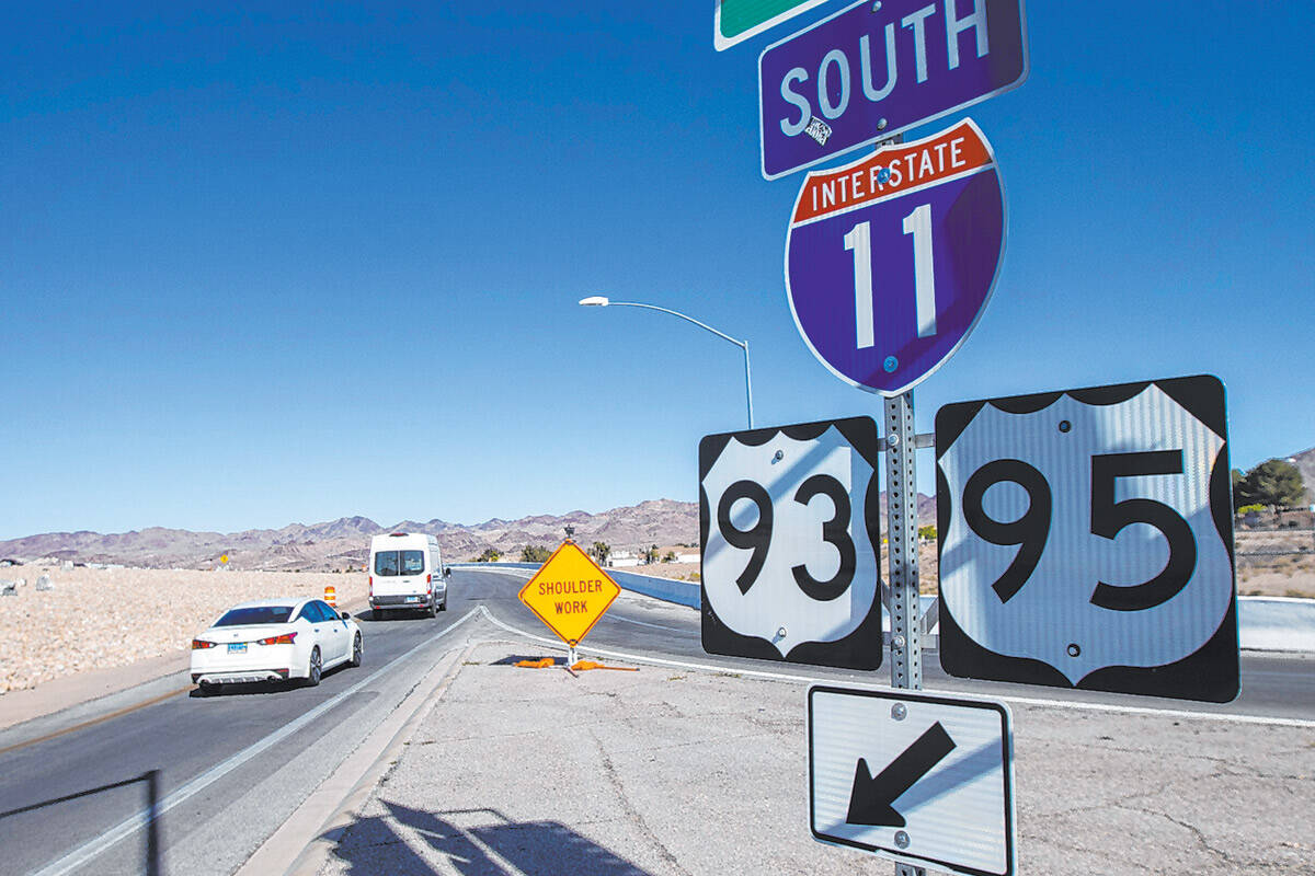 Vehicles move along the southbound on-ramp for Interstate 11 at College Drive in Henderson on W ...