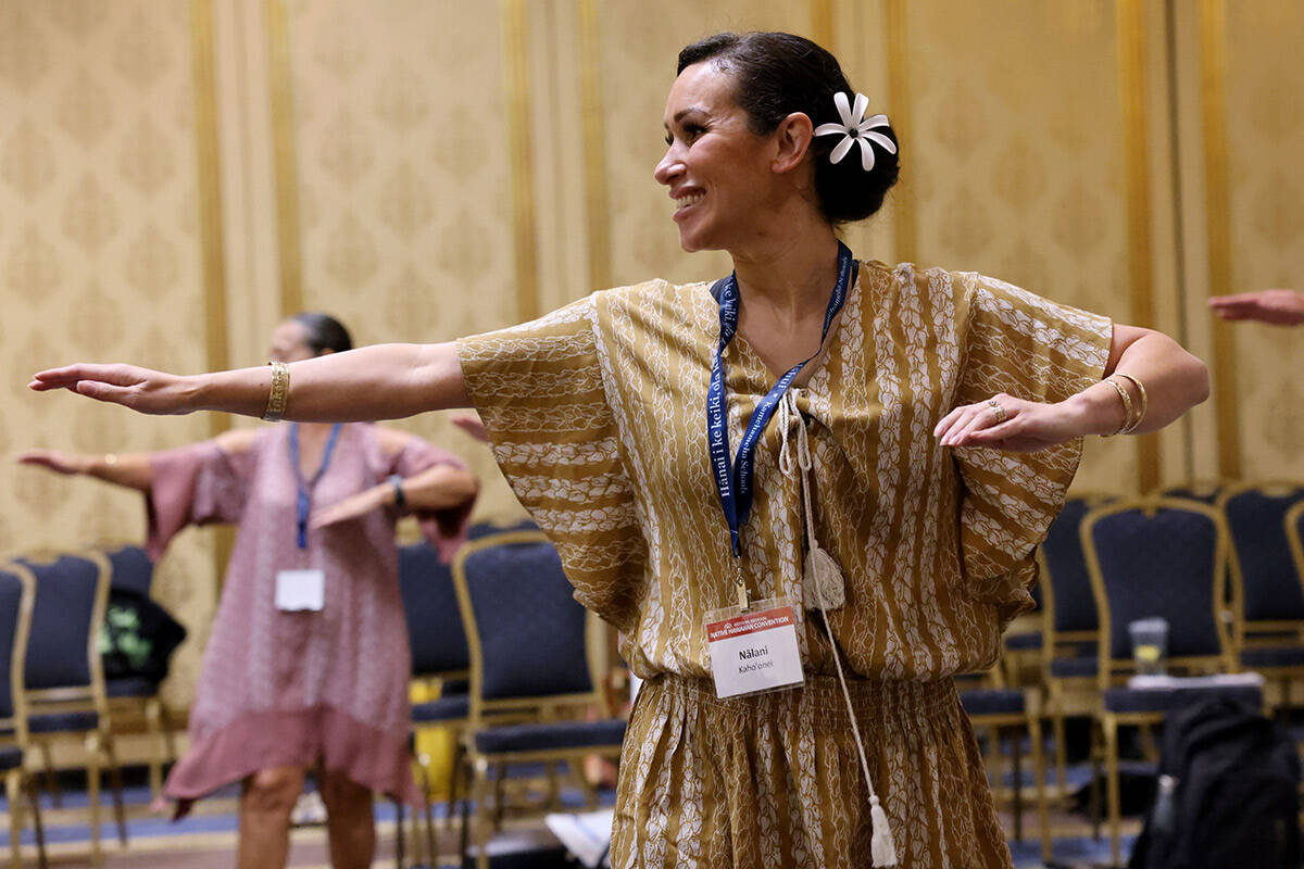 Nalani Kaho’onei of Gilbert, Ariz. takes takes part in a hula workshop on Day 1 of the W ...