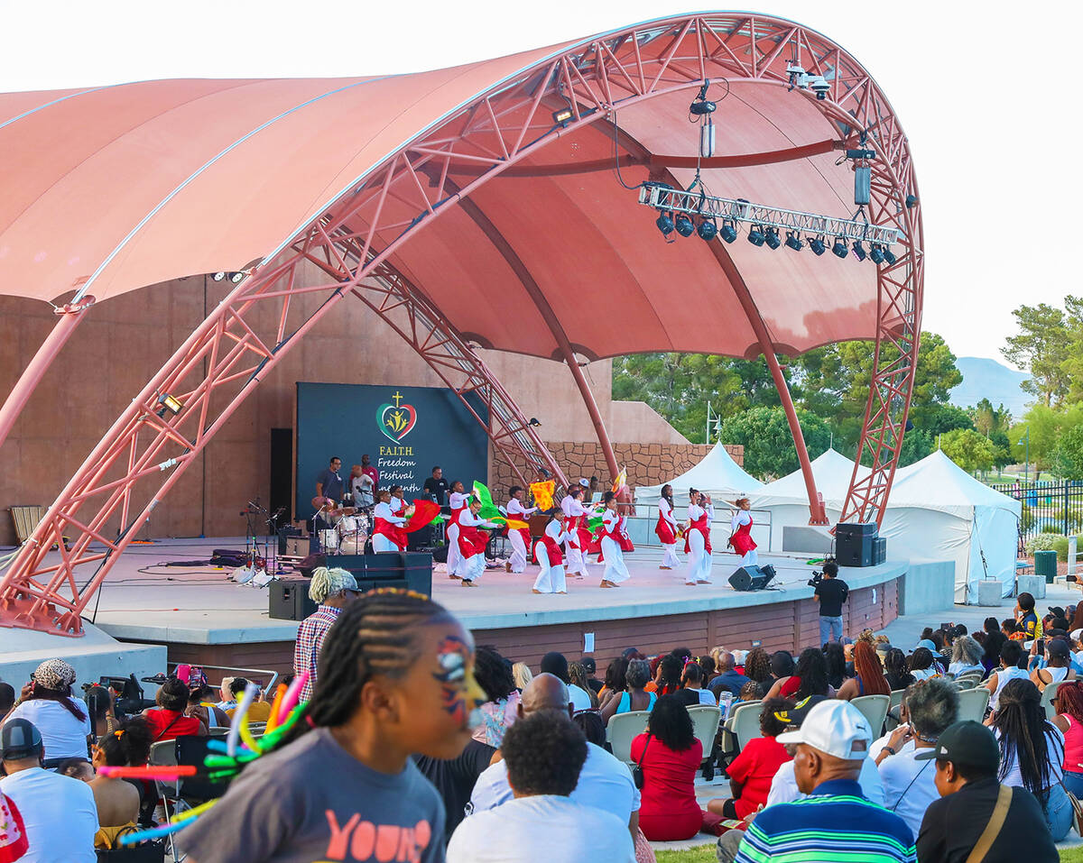 A large crowd watches dance and musical performances at the amphitheater in Craig Ranch Regiona ...