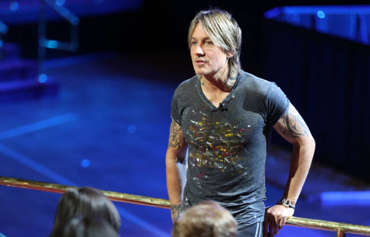 Keith Urban talks to guitar students from Las Vegas Academy at the Colosseum in March 2022 on t ...