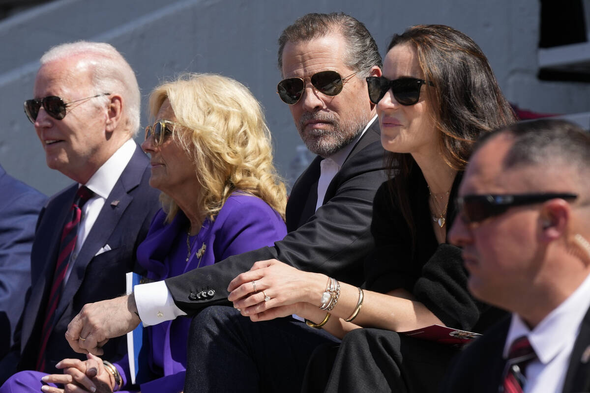 FILE - President Joe Biden attends his granddaughter Maisy Biden's commencement ceremony with f ...