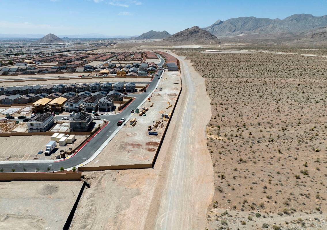 Aerial view of existing homes and housing construction sites in the northwest area of Las Vegas ...