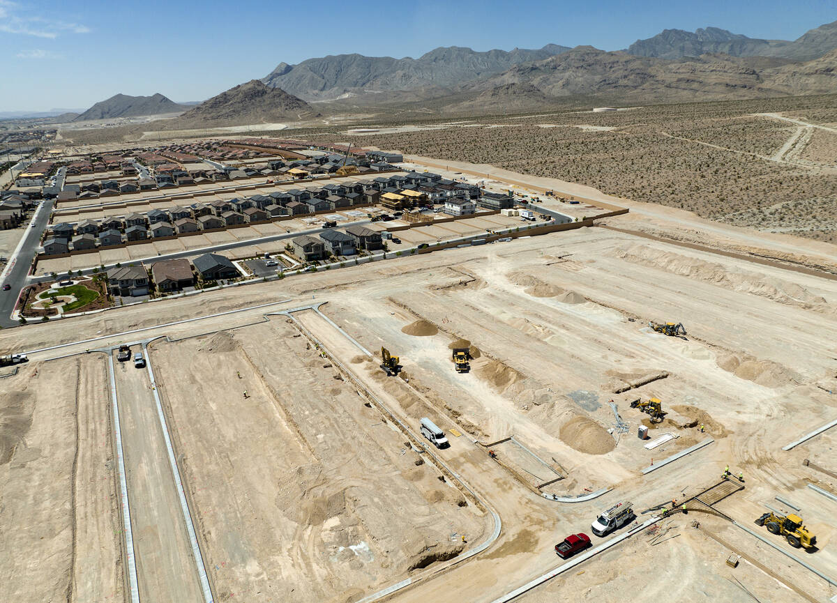 Aerial view of existing homes and housing construction sites in the northwest area of Las Vegas ...