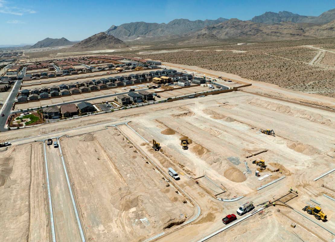 Aerial view of existing homes and housing construction sites in the northwest area of Las Vegas ...