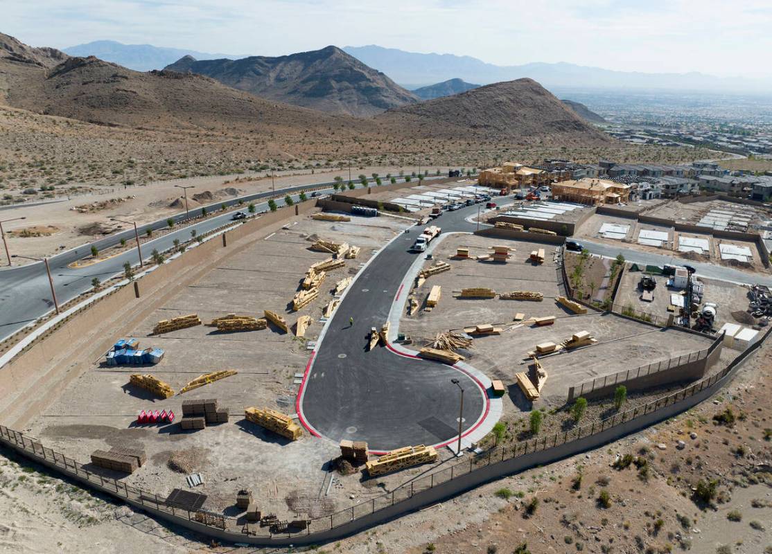 Aerial view of housing construction sites at Crested Canyon community in Summerlin on Thursday, ...