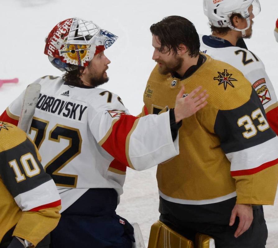 Florida Panthers goaltender Sergei Bobrovsky (72) congratulates Golden Knights goaltender Adin ...