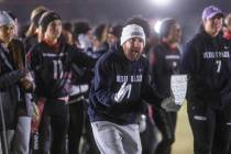 Desert Oasis Head Coach Todd Thomson yells to his players against Legacy during the first half ...