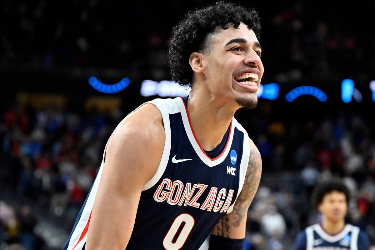 Gonzaga's Julian Strawther (0) celebrates after the team defeated UCLA in Sweet 16 college bask ...