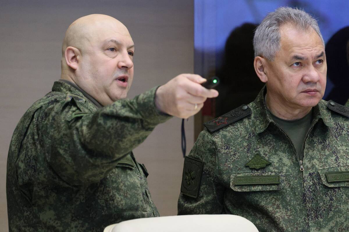 FILE - The top Russian military commander in Ukraine, Gen. Sergei Surovikin, left, and Russian ...