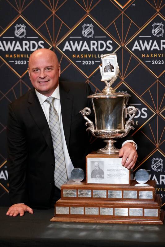 Boston Bruins hockey head coach Jim Montgomery poses after winning the Jack Adams Award at the ...