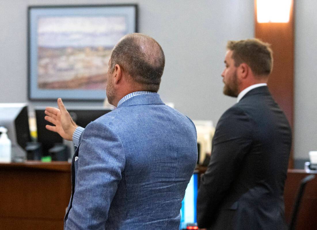 Deputy District Attorney Jory Scarborough, right, listens as defense attorney Ross Goodman, rep ...