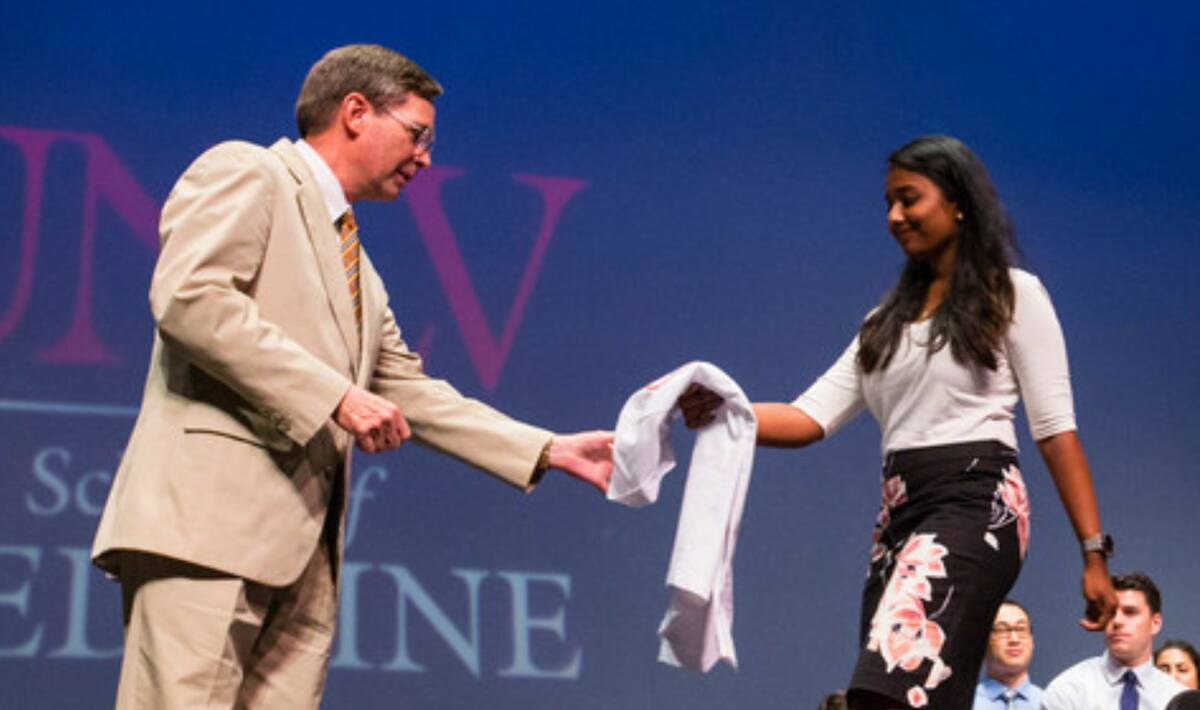 UNLV School of Medicine professor Jeffrey Fahl, left, looks to congratulate class of 2022 stude ...