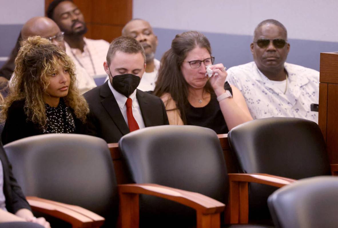 Former Eldorado High School teacher, Sade, listens to the judge with her husband Gabriel, mothe ...