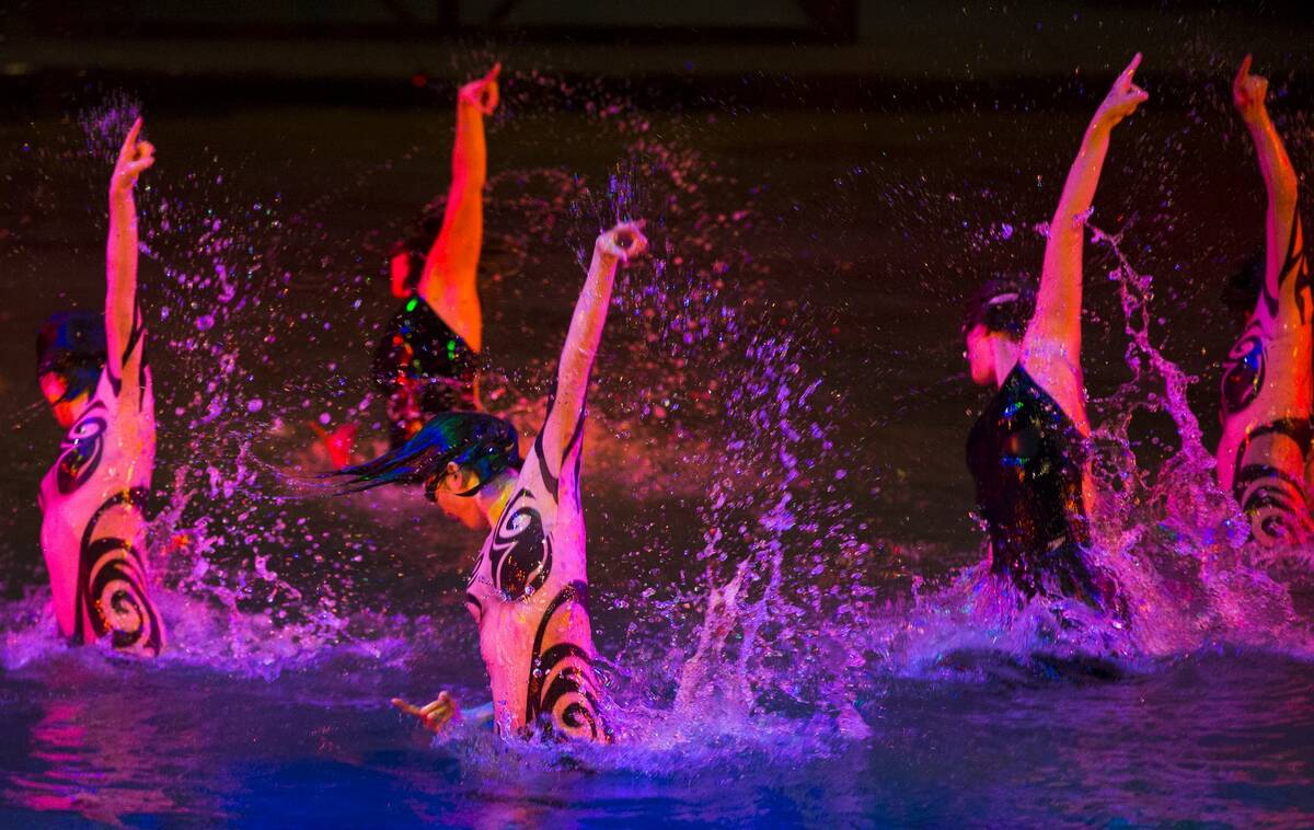 Performers with Cirque du Soleil rehearse a scene during a sneak preview of the "One Night for ...