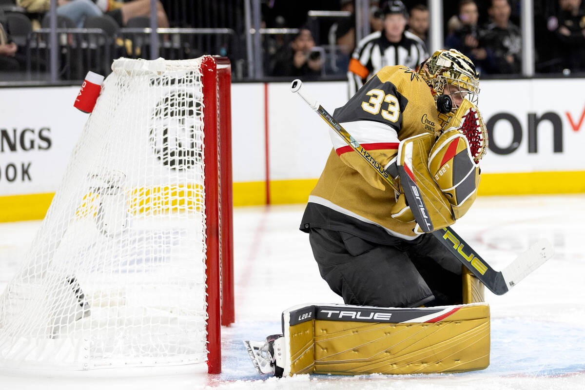 Golden Knights goaltender Adin Hill (33) saves the puck during the second period in Game 5 of t ...