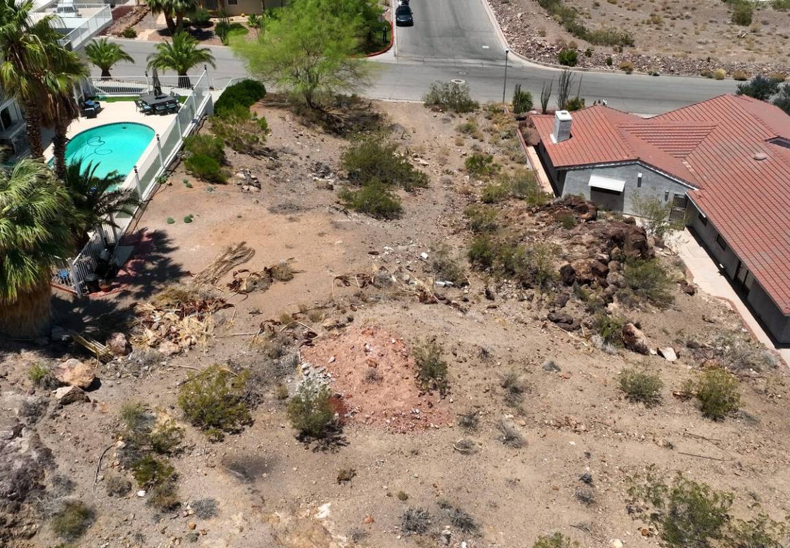 A vacant homesite, center, is seen at the corner of Judi Place and Isabel Drive, on June 2, 202 ...