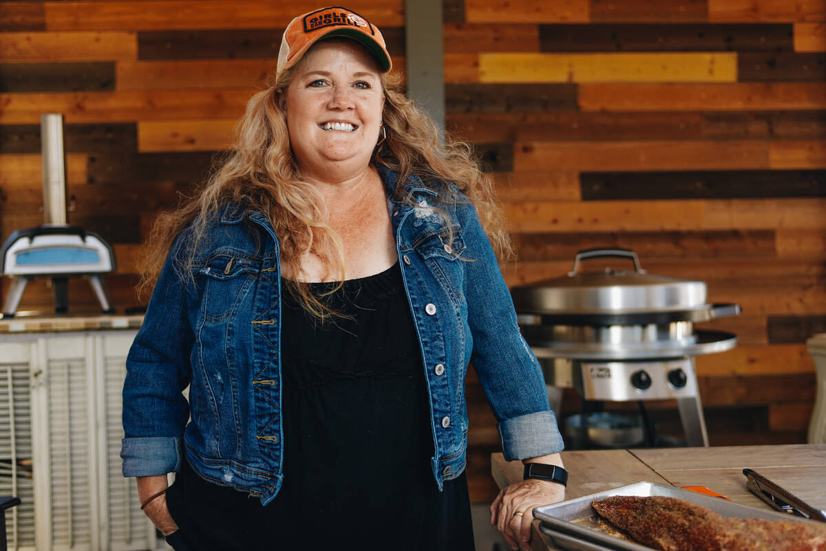 Christie Vanover poses for a portrait on Friday, June 30, 2023, in her backyard grill space in ...