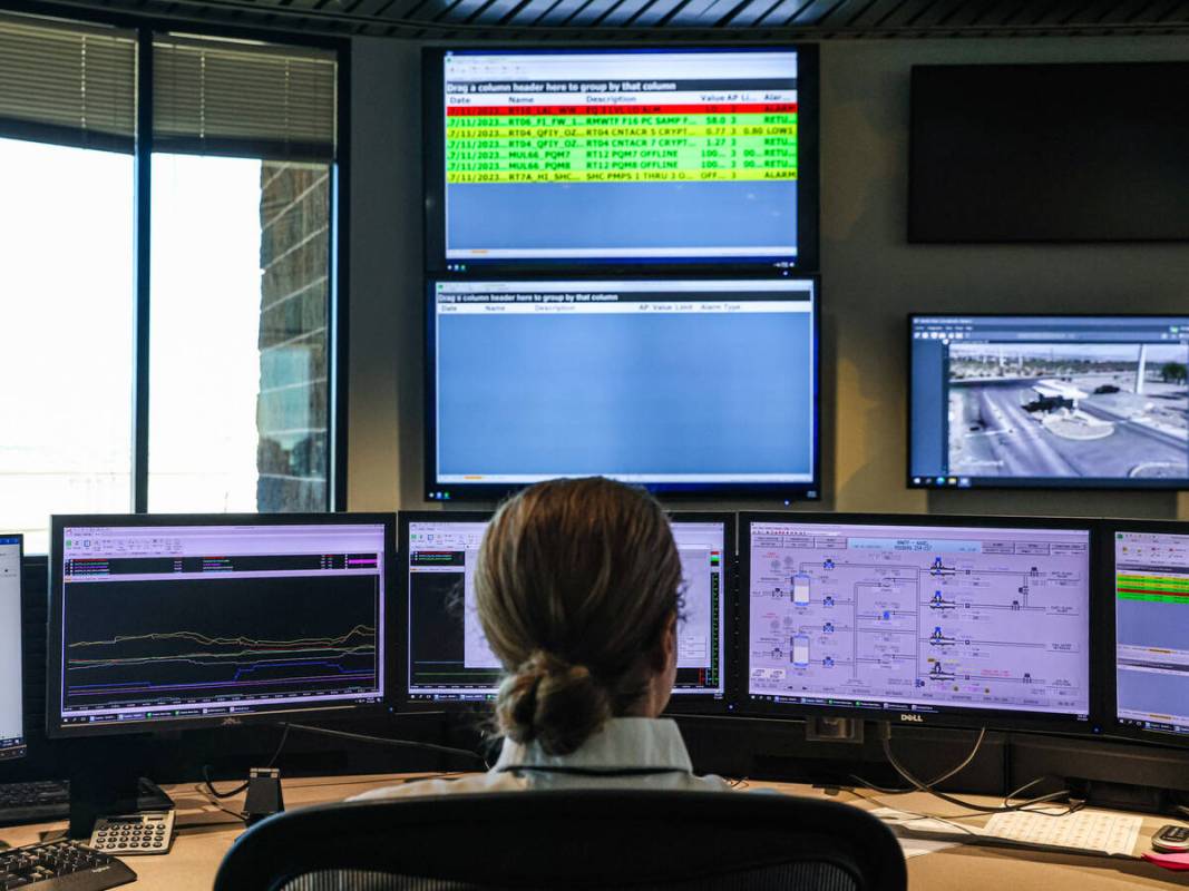 Joseph Eggers, a water treatment operator, works in the control room at the River Mountain Wate ...