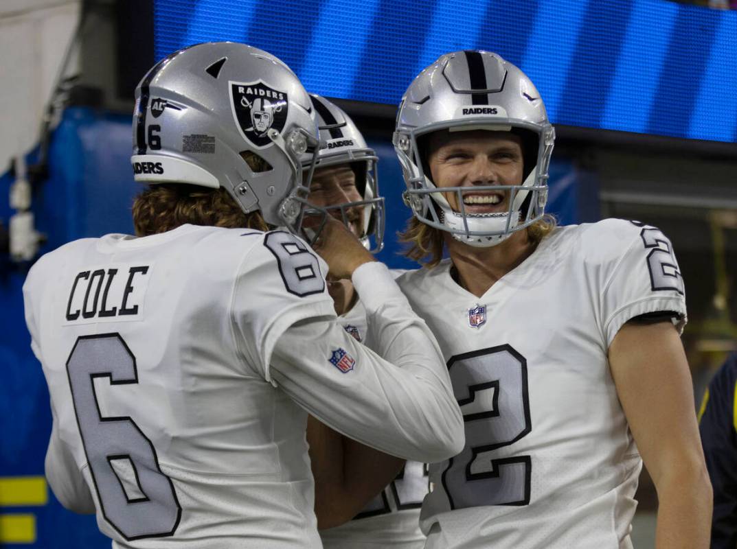 Raiders place kicker Daniel Carlson (2), punter AJ Cole (6) and long snapper Trent Sieg (47) hu ...