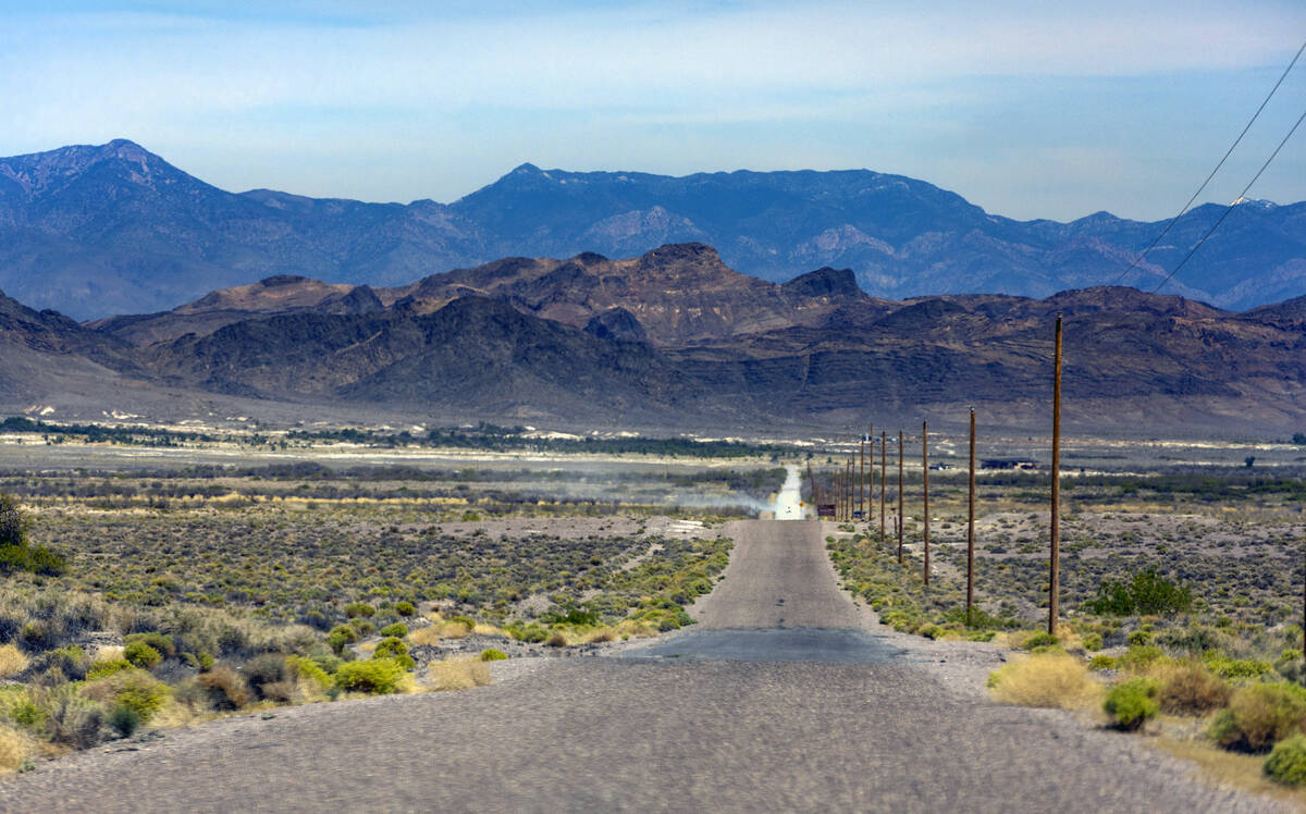 Ash Meadows Road drops down into the Ash Meadows National Wildlife Refuge on May 9, 2023, in Am ...
