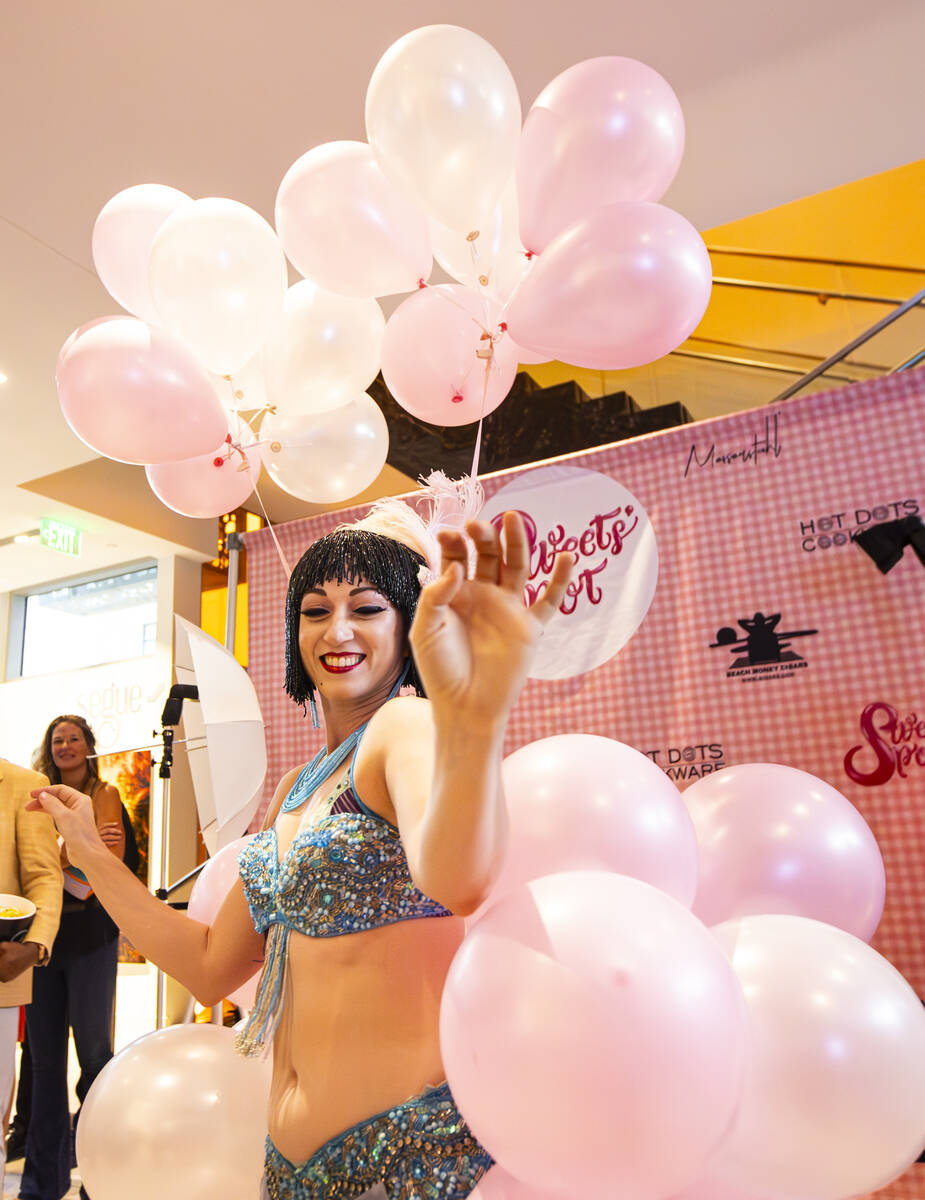 Burlesque artist Michelle L’Amour performs during the wrap party for the Sweets’ Spot web s ...