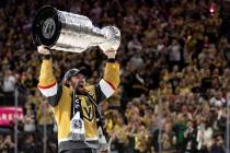 Golden Knights right wing Mark Stone (61) celebrates with the Stanley Cup after winning the NHL ...
