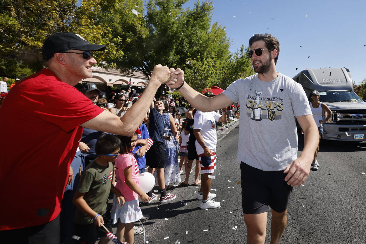 Golden Knights defenseman Nicolas Hague receives a high-five during the annual Summerlin Counci ...