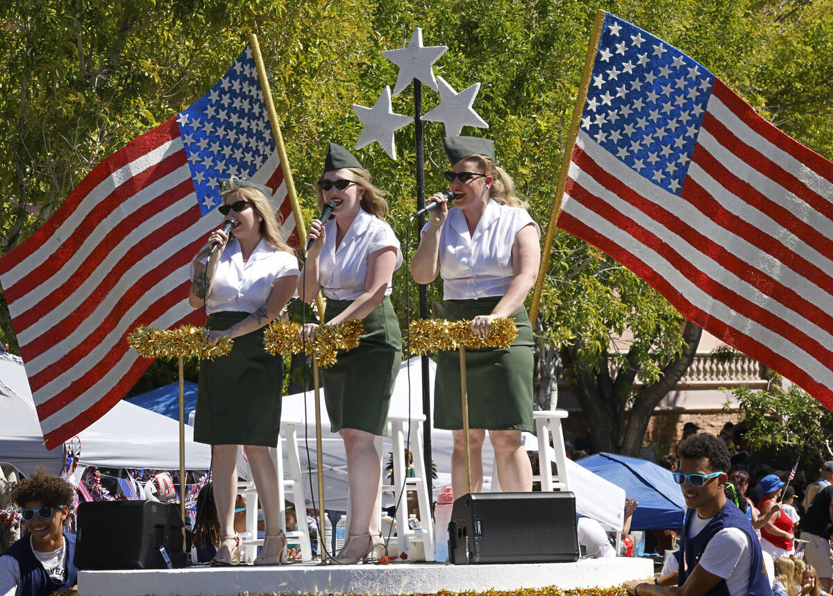 Singers perform on a float during the annual Summerlin Council Patriotic Parade, Tuesday, July ...