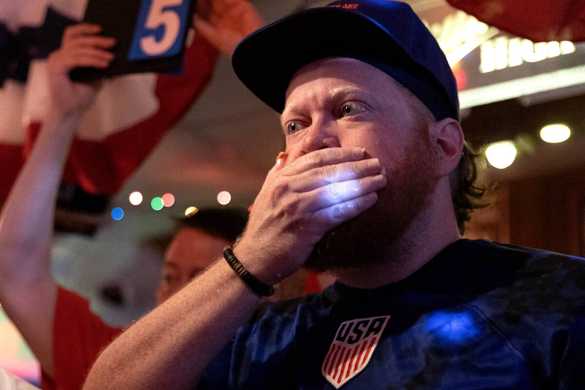 Thomas Stout keeps his hot dogs in during the third annual Fourth of July hot dog eating contes ...