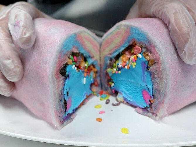 Creamberry’s cotton candy burrito is your choice of ice cream flavor and toppings wrapped in ...