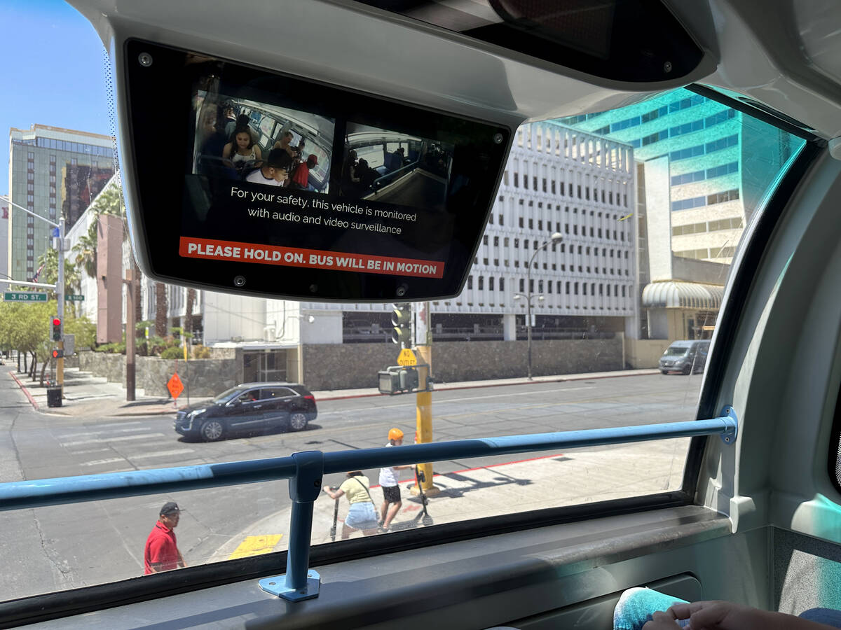 A screen notifies passenger about video surveillance on a Regional Transportation Commission bu ...